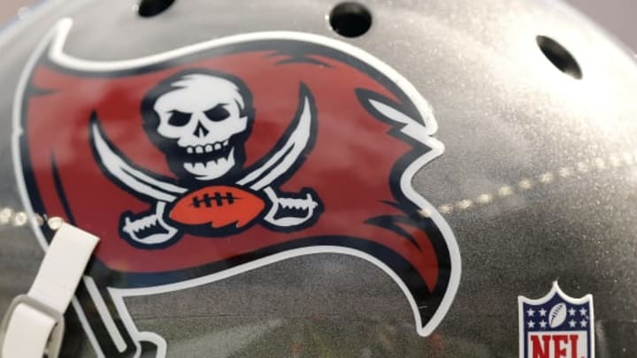 FOXBORO, MA – SEPTEMBER 22: A Tampa Bay Buccaneers helmet and logo are seen during the second half of their 23-3 loss to the New England Patriots at Gillette Stadium on September 22, 2013 in Foxboro, Massachusetts. (Photo by Winslow Townson/Getty Images)