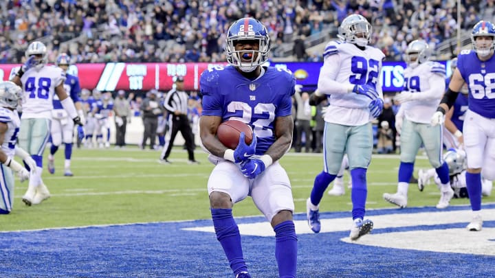 EAST RUTHERFORD, NEW JERSEY – DECEMBER 30: Wayne Gallman #22 of the New York Giants celebrates his fourth quarter touchdown against the Dallas Cowboys at MetLife Stadium on December 30, 2018 in East Rutherford, New Jersey. (Photo by Steven Ryan/Getty Images)