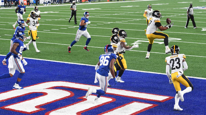 EAST RUTHERFORD, NEW JERSEY – SEPTEMBER 14: Cameron Heyward #97 of the Pittsburgh Steelers intercepts a pass during the second half against the New York Giants at MetLife Stadium on September 14, 2020 in East Rutherford, New Jersey. (Photo by Sarah Stier/Getty Images)