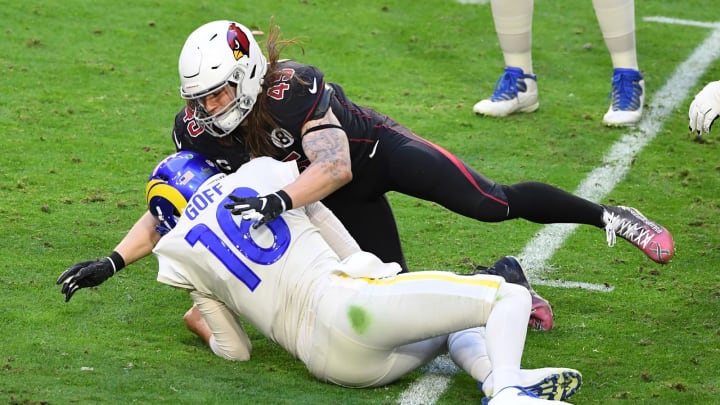 Jared Goff #16 of the Los Angeles Rams is sacked by linebacker Dennis Gardeck #45 of the Arizona Cardinal (Photo by Norm Hall/Getty Images)