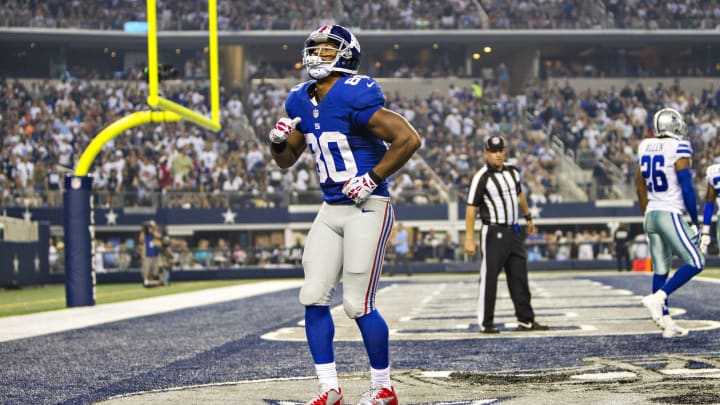 ARLINGTON, TX – SEPTEMBER 08: Victor Cruz #80 of the New York Giants does his touchdown dance against the Dallas Cowboys at AT&T Stadium on September 8, 2013 in Arlington, Texas. The Cowboys defeated the Giants 36-31. (Photo by Wesley Hitt/Getty Images)