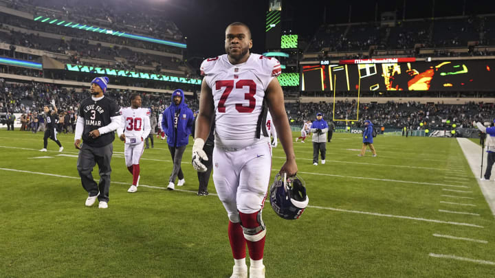 PHILADELPHIA, PA – JANUARY 08: Evan Neal #73 of the New York Giants walks off the field after the game against the Philadelphia Eagles at Lincoln Financial Field on January 8, 2023 in Philadelphia, Pennsylvania. (Photo by Mitchell Leff/Getty Images)