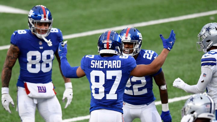 NY Giants wide receiver Sterling Shepard (87) celebrates his touchdown with running back Wayne Gallman (22) and tight end Evan Engram (88) against the Dallas Cowboys in a game at MetLife Stadium on Sunday, January 3, 2021, in East Rutherford.