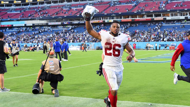 Sep 11, 2022; Nashville, Tennessee, USA; New York Giants running back Saquon Barkley (26) leaves the field after a win against the Tennessee Titans at Nissan Stadium. Mandatory Credit: Christopher Hanewinckel-USA TODAY Sports