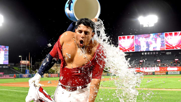 ANAHEIM, CA – SEPTEMBER 24: Jefry Marte #19 of the Los Angeles Angels of Anaheim pours a cooler of ice water on Jose Briceno #10 of the Los Angeles Angels of Anaheim after he hit a pinch hit walk off home run in the eleventh inning of the game against the Texas Rangers at Angel Stadium on September 24, 2018 in Anaheim, California. (Photo by Jayne Kamin-Oncea/Getty Images)