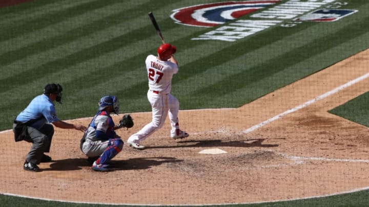 ANAHEIM, CALIFORNIA - APRIL 07: Mike Trout #27 of the Los Angeles Angels of Anaheim hits a two-run home run in the sixth inning of the MLB game against the Texas Rangers at Angel Stadium of Anaheim on April 07, 2019 in Anaheim, California. (Photo by Victor Decolongon/Getty Images)
