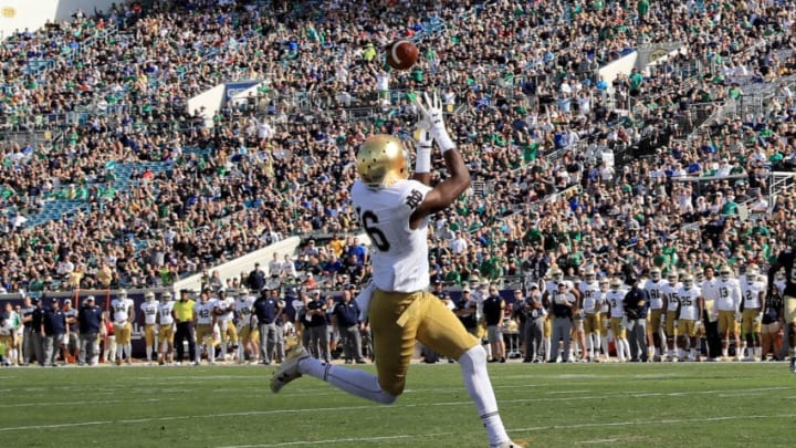 JACKSONVILLE, FL - NOVEMBER 05: Torii Hunter Jr. #16 of the Notre Dame Fighting Irish attempts a reception during the game against the Navy Midshipmen at EverBank Field on November 5, 2016 in Jacksonville, Florida. (Photo by Sam Greenwood/Getty Images)
