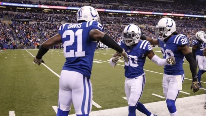 Nov 8, 2015; Indianapolis, IN, USA; Indianapolis Colts cornerback Darius Butler (20) is congratulated by his teammates after making an interception against the Denver Broncos in the 4th quarter at Lucas Oil Stadium. Indianapolis defeats Denver 27-24. Mandatory Credit: Brian Spurlock-USA TODAY Sports