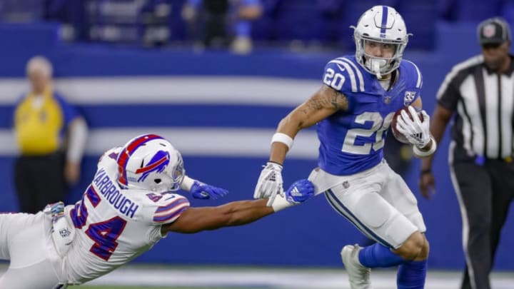 INDIANAPOLIS, IN - OCTOBER 21: Jordan Wilkins #20 of the Indianapolis Colts runs the ball as Eddie Yarbrough #54 of the Buffalo Bills reaches for the tackle at Lucas Oil Stadium on October 21, 2018 in Indianapolis, Indiana. (Photo by Michael Hickey/Getty Images) INDIANAPOLIS, IN - OCTOBER 21: Jordan Wilkins #20 of the Indianapolis Colts runs the ball as Eddie Yarbrough #54 of the Buffalo Bills reaches for the tackle at Lucas Oil Stadium on October 21, 2018 in Indianapolis, Indiana. (Photo by Michael Hickey/Getty Images)