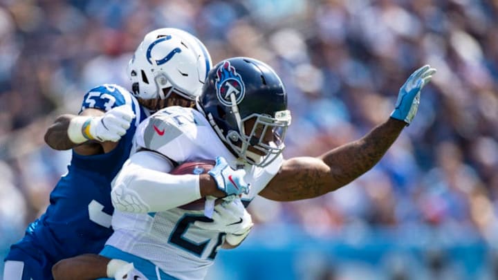 NASHVILLE, TN - SEPTEMBER 15: Derrick Henry #22 of the Tennessee Titans is brought down by Khari Willis #37 and Darius Leonard #53 of the Indianapolis Colts during the first quarter at Nissan Stadium on September 15, 2019 in Nashville, Tennessee. (Photo by Brett Carlsen/Getty Images) NASHVILLE, TN - SEPTEMBER 15: Derrick Henry #22 of the Tennessee Titans is brought down by Khari Willis #37 and Darius Leonard #53 of the Indianapolis Colts during the first quarter at Nissan Stadium on September 15, 2019 in Nashville, Tennessee. (Photo by Brett Carlsen/Getty Images)