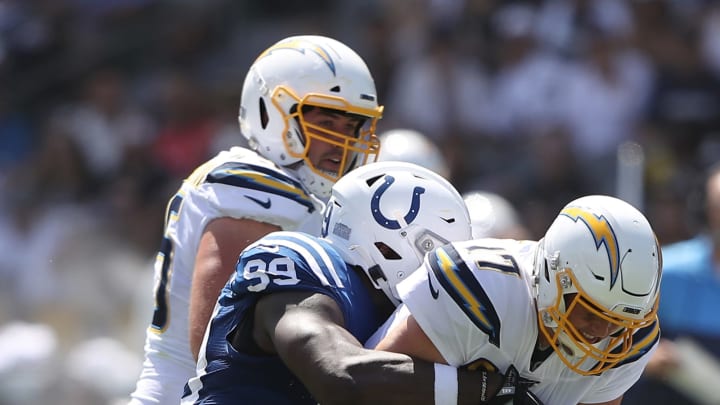 CARSON, CALIFORNIA – SEPTEMBER 08: Philip Rivers #17 of the Los Angeles Chargers is sacked by Justin Houston #99 of the Indianapolis Colts during the first half of a game at Dignity Health Sports Park on September 08, 2019 in Carson, California. (Photo by Sean M. Haffey/Getty Images)
