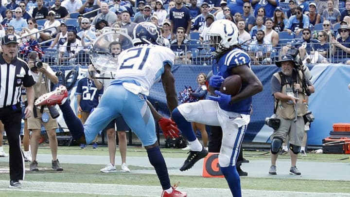 NASHVILLE, TENNESSEE - SEPTEMBER 15: T.Y. Hilton #13 of the Indianapolis Colts catches a touchdown pass against Malcolm Butler #21 of the Tennessee Titans during the second half at Nissan Stadium on September 15, 2019 in Nashville, Tennessee. (Photo by Frederick Breedon/Getty Images)