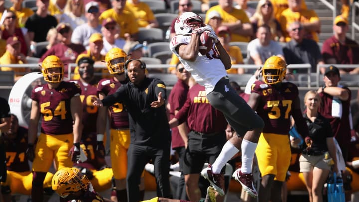 TEMPE, ARIZONA – OCTOBER 12: Wide receiver Dezmon Patmon #12 of the Washington State Cougars catches a deep pass over defensive back Jack Jones #21 of the Arizona State Sun Devils during the first half of the NCAAF game at Sun Devil Stadium on October 12, 2019 in Tempe, Arizona. (Photo by Christian Petersen/Getty Images)