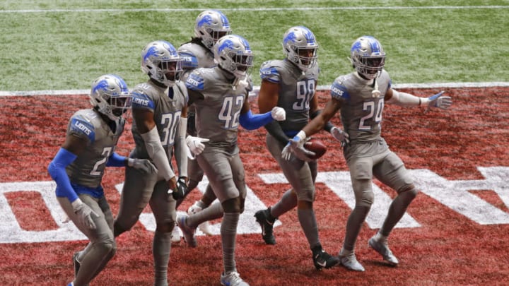 ATLANTA, GEORGIA - OCTOBER 25: Trey Flowers #90 of the Detroit Lions celebrates a fumble recovery with his teammates during the second half against the Atlanta Falcons at Mercedes-Benz Stadium on October 25, 2020 in Atlanta, Georgia. (Photo by Kevin C. Cox/Getty Images)