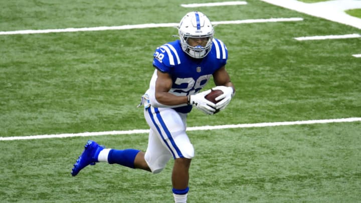 INDIANAPOLIS, INDIANA - OCTOBER 18: Jonathan Taylor #28 of the Indianapolis Colts carries the ball against the Cincinnati Bengals during the first half at Lucas Oil Stadium on October 18, 2020 in Indianapolis, Indiana. (Photo by Andy Lyons/Getty Images)