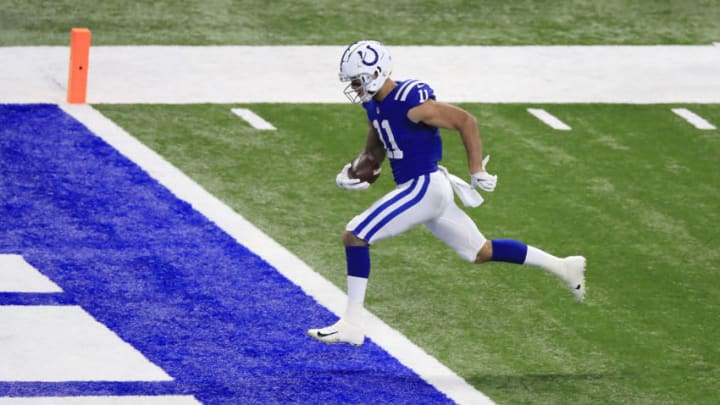 INDIANAPOLIS, INDIANA - NOVEMBER 22: Michael Pittman #11 of the Indianapolis Colts scores a touchdown during the first quarter against the Green Bay Packers in the game at Lucas Oil Stadium on November 22, 2020 in Indianapolis, Indiana. (Photo by Andy Lyons/Getty Images)