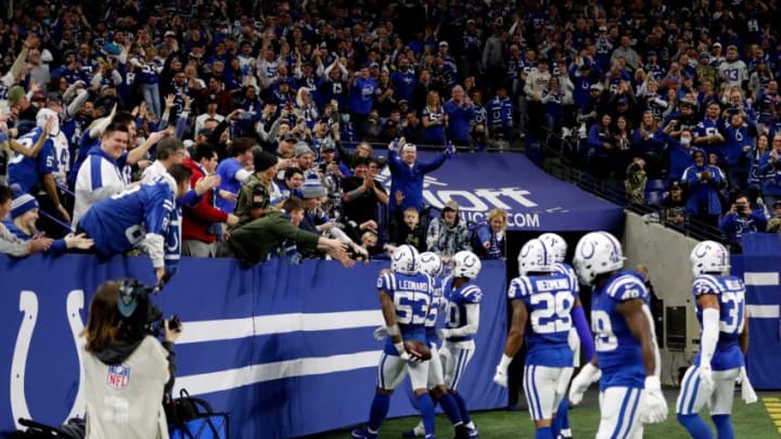 Indianapolis Colts outside linebacker Darius Leonard (53) and teammates celebrate with fans after Leonard's interception Sunday, Jan. 2, 2022, during a game against the Las Vegas Raiders at Lucas Oil Stadium in Indianapolis.