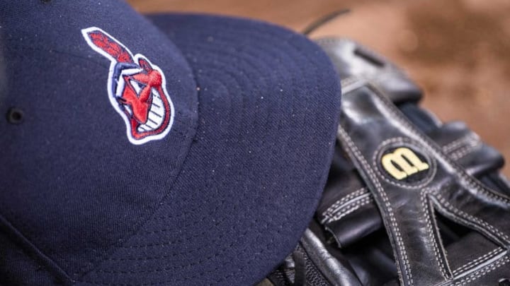 May 16, 2015; Arlington, TX, USA; A view of a Cleveland Indians baseball hat and glove during the game between the Texas Rangers and the Indians at Globe Life Park in Arlington. The Indians defeated the Rangers 10-8. Mandatory Credit: Jerome Miron-USA TODAY Sports