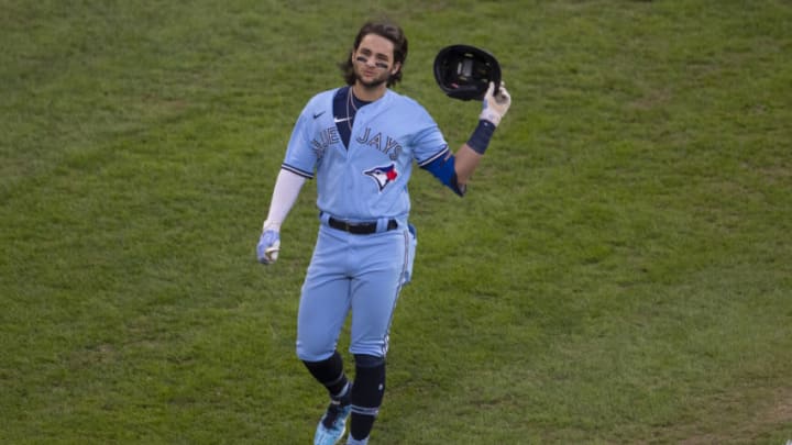 PHILADELPHIA, PA - SEPTEMBER 18: Bo Bichette #11 of the Toronto Blue Jays reacts after grounding into a double play to end the bottom of the sixth inning against the Philadelphia Phillies during Game One of the doubleheader at Citizens Bank Park on September 18, 2020 in Philadelphia, Pennsylvania. The Phillies defeated the Blue Jays 7-0. (Photo by Mitchell Leff/Getty Images)