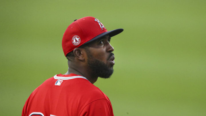 LOS ANGELES, CALIFORNIA - MARCH 30: Dexter Fowler #25 of the Los Angeles Angels looks on from the outfield during the game against the Los Angeles Dodgers on March 30, 2021 in Los Angeles, California. (Photo by Meg Oliphant/Getty Images)