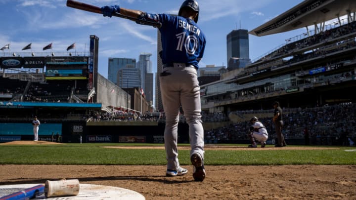 MINNEAPOLIS, MN - SEPTEMBER 26: Marcus Semien #10 of the Toronto Blue Jays takes a practice swing in the on deck circle before batting in the third inning of the game against the Minnesota Twins at Target Field on September 26, 2021 in Minneapolis, Minnesota. (Photo by Stephen Maturen/Getty Images)