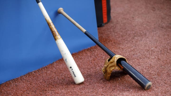 TORONTO, ON - OCTOBER 01: Bats and batting gloves are seen ahead of the Toronto Blue Jays MLB game against the Baltimore Orioles at Rogers Centre on October 1, 2021 in Toronto, Ontario. (Photo by Cole Burston/Getty Images)