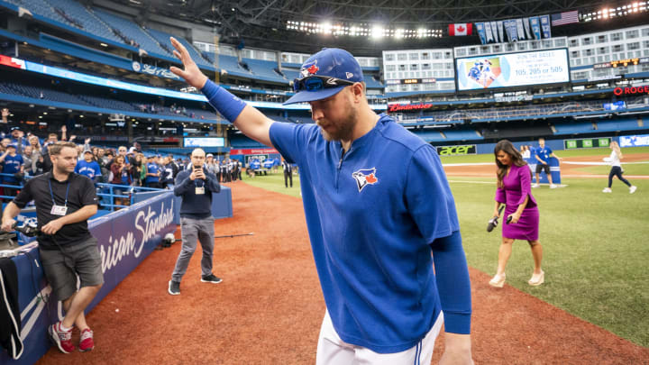TORONTO, ONTARIO – SEPTEMBER 29: Justin Smoak #14 of the Toronto Blue Jays walks off the field after his team defeated the Tampa Bay Rays in the final game of the season in their MLB game at the Rogers Centre on September 29, 2019 in Toronto, Canada. (Photo by Mark Blinch/Getty Images)