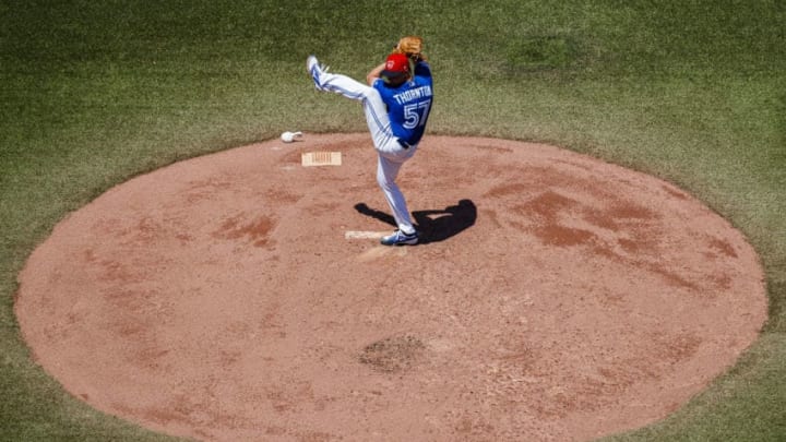 TORONTO, ONTARIO - JULY 7: Trent Thornton #57 of the Toronto Blue Jays pitches to the Baltimore Orioles in the first inning during their MLB game at the Rogers Centre on July 7, 2019 in Toronto, Canada. (Photo by Mark Blinch/Getty Images)