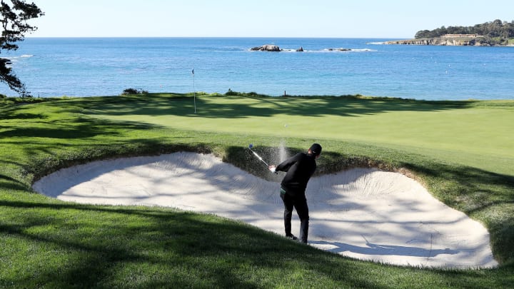 PEBBLE BEACH, CALIFORNIA – FEBRUARY 09: Jason Day of Australia plays a shot from a bunker on the fifth hole during the final round of the AT&T Pebble Beach Pro-Am at Pebble Beach Golf Links on February 09, 2020 in Pebble Beach, California. (Photo by Sean M. Haffey/Getty Images)