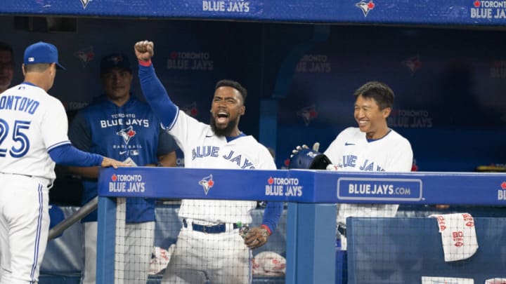 Apr 8, 2022; Toronto, Ontario, CAN; Toronto Blue Jays right fielder Teoscar Hernandez (37) reacts after his slide into home plate was overturned and called safe during the seventh inning against the Texas Rangers at Rogers Centre . Mandatory Credit: Nick Turchiaro-USA TODAY Sports
