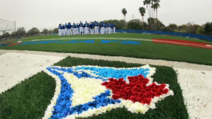 Feb 25, 2015; Dunedin, FL, USA; Toronto Blue Jays pitchers and catcher talk during spring training workouts at Bobby Mattick Training Center. Mandatory Credit: Kim Klement-USA TODAY Sports