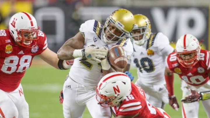 Dec 26, 2015; Santa Clara, CA, USA; Nebraska Cornhuskers defensive back Antonio Reed (16) tackles UCLA Bruins running back Paul Perkins (24) making him lose the ball out of bounds at Levi