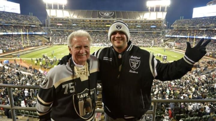 Dec 24, 2015; Oakland, CA, USA; Oakland Raiders fans Dennis Busch (left) and Zach Masch pose during an NFL football game against the San Diego Chargers at O.co Coliseum. Mandatory Credit: Kirby Lee-USA TODAY Sports