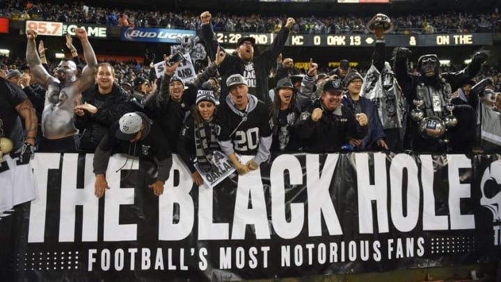 November 20, 2014; Oakland, CA, USA; Oakland Raiders fans celebrate during the second quarter against the Kansas City Chiefs at O.co Coliseum. Mandatory Credit: Kyle Terada-USA TODAY Sports