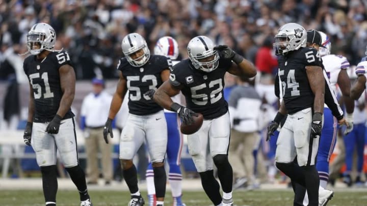 Dec 4, 2016; Oakland, CA, USA; Oakland Raiders defensive end Khalil Mack (52) reacts after recovering a forced fumble against the Buffalo Bills in the fourth quarter at Oakland Coliseum. The Raiders defeated the Bills 38-24. Mandatory Credit: Cary Edmondson-USA TODAY Sports