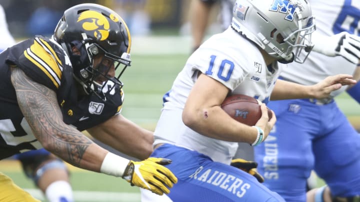 IOWA CITY, IOWA- SEPTEMBER 28: Defensive end A.J. Epenesa #94 of the Iowa Hawkeyes gives chase during the first half on quarterback Asher OHara #10of the Middle Tennessee Blue Raiders on September 28, 2019 at Kinnick Stadium in Iowa City, Iowa. (Photo by Matthew Holst/Getty Images)