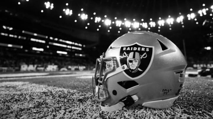 LONDON, ENGLAND - OCTOBER 06: (EDITORS NOTE - This image has been converted to black and white) Oakland Raiders helmet is seen on the field after the game between Chicago Bears and Oakland Raiders at Tottenham Hotspur Stadium on October 06, 2019 in London, England. (Photo by Naomi Baker/Getty Images)