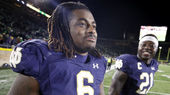 SOUTH BEND, IN – OCTOBER 12: Tony Jones Jr. #6 and Jalen Elliott #21 of the Notre Dame Fighting Irish celebrate after the game against the USC Trojans at Notre Dame Stadium on October 12, 2019 in South Bend, Indiana. Notre Dame defeated USC 30-27. (Photo by Joe Robbins/Getty Images)