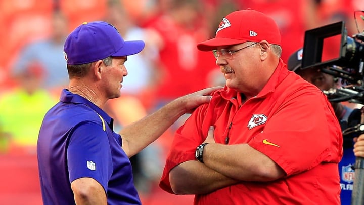 KANSAS CITY, MO – AUGUST 23: Head coach Mike Zimmer of the Minnesota Vikings and head coach Andy Reid of the Kansas City Chiefs speak before their game at Arrowhead Stadium on August 23, 2014 in Kansas City, Missouri. (Photo by Jamie Squire/Getty Images)