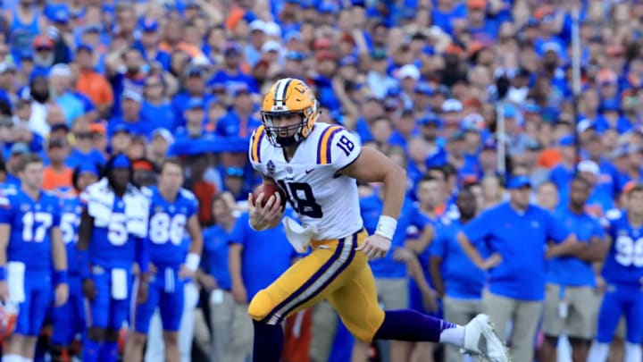 GAINESVILLE, FL - OCTOBER 06: Foster Moreau #18 of the LSU Tigers rushes for yardage during the game against the Florida Gators at Ben Hill Griffin Stadium on October 6, 2018 in Gainesville, Florida. (Photo by Sam Greenwood/Getty Images)