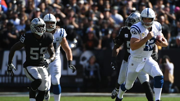 OAKLAND, CA – OCTOBER 28: Andrew Luck #12 of the Indianapolis Colts scrambles with the ball against the Oakland Raiders during their NFL game at Oakland-Alameda County Coliseum on October 28, 2018 in Oakland, California. (Photo by Robert Reiners/Getty Images)