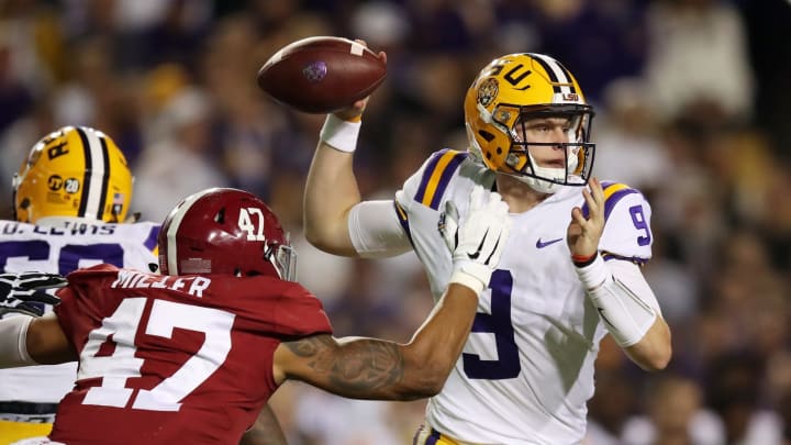 BATON ROUGE, LOUISIANA – NOVEMBER 03: Christian Miller #47 of the Alabama Crimson Tide attempts to sack Joe Burrow #9 of the LSU Tigers in the second quarter of their game at Tiger Stadium on November 03, 2018 in Baton Rouge, Louisiana. (Photo by Gregory Shamus/Getty Images)