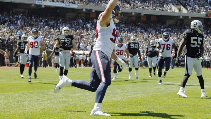 JJ Watt vs. the Raiders. (Photo by Brian Bahr/Getty Images)