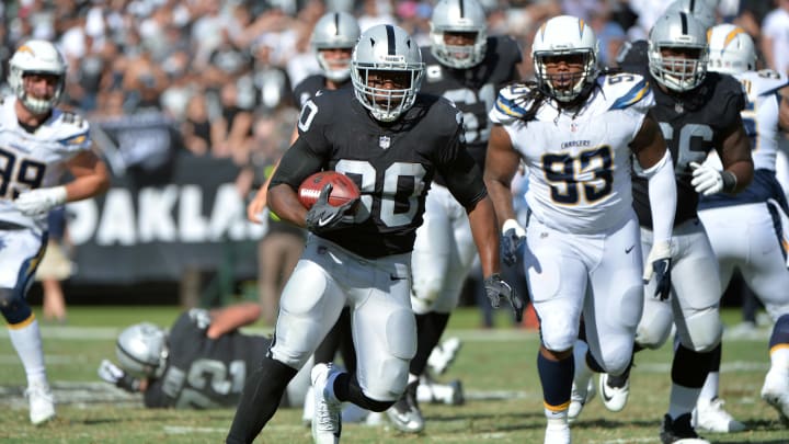 OAKLAND, CA – OCTOBER 15: Jalen Richard #30 of the Oakland Raiders rushes with the ball against the Los Angeles Chargers during their NFL game at Oakland-Alameda County Coliseum on October 15, 2017 in Oakland, California. (Photo by Don Feria/Getty Images)