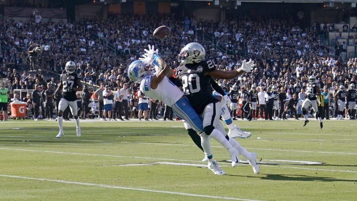 OAKLAND, CALIFORNIA – NOVEMBER 03: Marvin Jones #11 of the Detroit Lions catches this pass over Isaiah Crowell #20 of the Oakland Raiders during the first quarter of an NFL football game at RingCentral Coliseum on November 03, 2019 in Oakland, California. (Photo by Thearon W. Henderson/Getty Images)