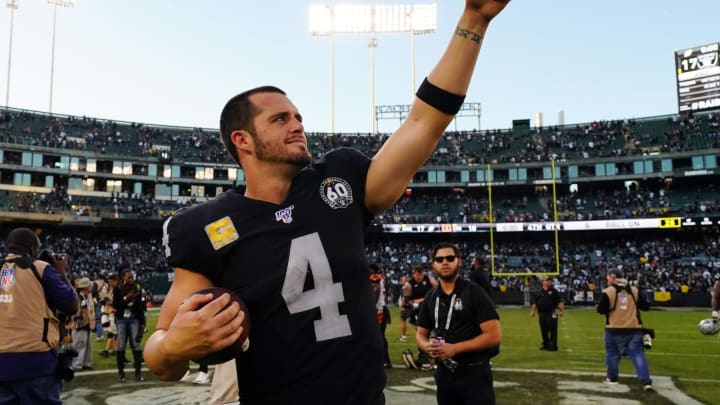 OAKLAND, CALIFORNIA – NOVEMBER 17: Derek Carr #4 of the Oakland Raiders waves to fans after beating the Cincinnati Bengals at RingCentral Coliseum on November 17, 2019 in Oakland, California. (Photo by Daniel Shirey/Getty Images)
