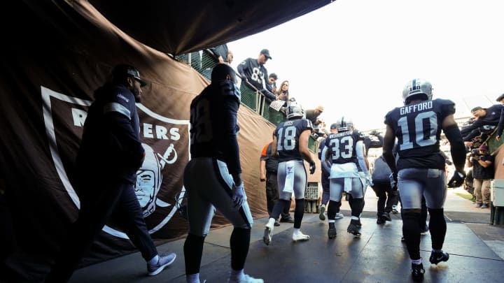 OAKLAND, CALIFORNIA – DECEMBER 15: The Oakland Raiders enter the field from the tunnel prior to the game against the Jacksonville Jaguars at RingCentral Coliseum on December 15, 2019 in Oakland, California. (Photo by Daniel Shirey/Getty Images)