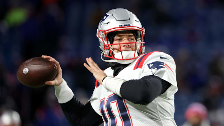 ORCHARD PARK, NY – DECEMBER 06: Mac Jones #10 of the New England Patriots throws a pass before a game against the Buffalo Bills at Highmark Stadium on December 6, 2021, in Orchard Park, New York. (Photo by Timothy T Ludwig/Getty Images)