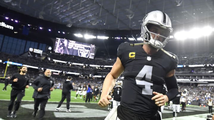 LAS VEGAS, NEVADA - JANUARY 09: Quarterback Derek Carr #4 of the Las Vegas Raiders runs off the field after warmups before a game against the Los Angeles Chargers at Allegiant Stadium on January 09, 2022 in Las Vegas, Nevada. The Raiders defeated the Chargers 35-32 in overtime. (Photo by Chris Unger/Getty Images)