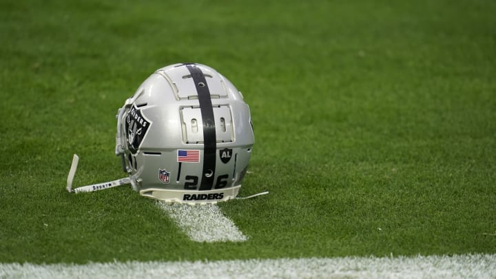 LAS VEGAS, NEVADA – DECEMBER 13: A close up view of the official helmet worn by Nevin Lawson #26 of the Las Vegas Raiders prior to an NFL game against the Indianapolis Colts on December 13, 2020 in Las Vegas, Nevada. (Photo by Cooper Neill/Getty Images)
